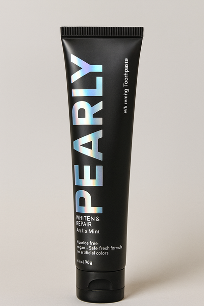 Black toothpaste tube with 'PEARLY' branding on a light gray background